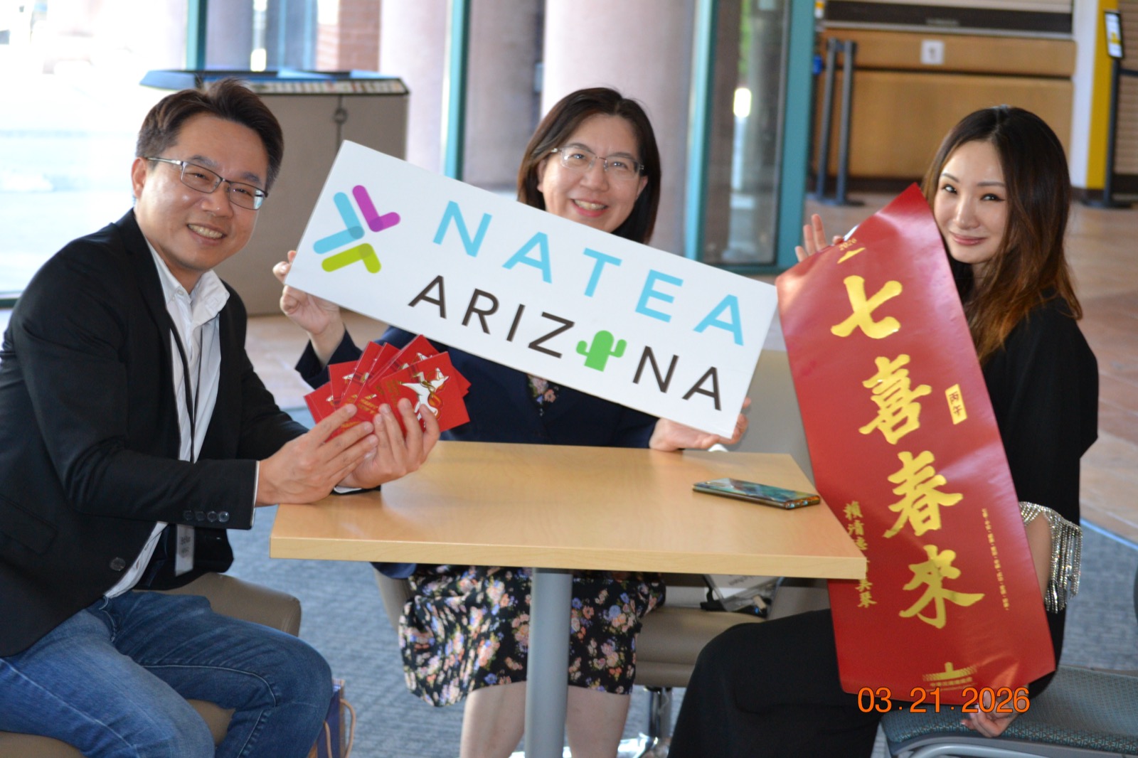 NATEA Arizona members holding chapter sign
